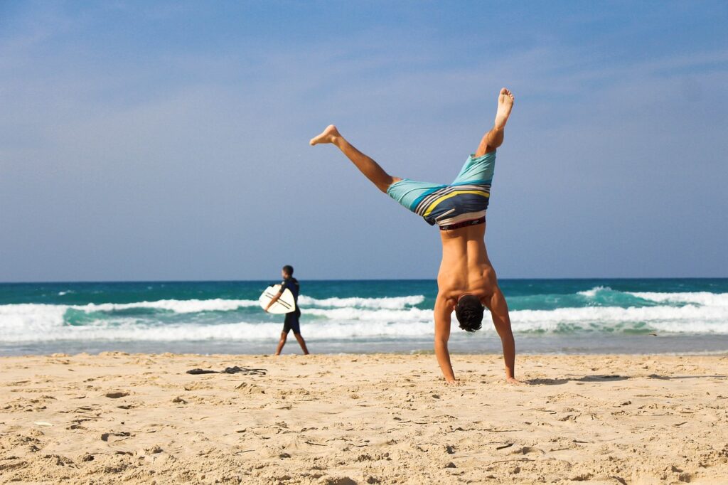 handstand, man, beach-2224104.jpg outdoor winter dubai