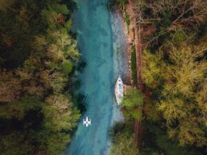 aerial shot of watersport using an efoil cycle to bike iin a lake using the jetcycle max