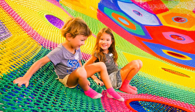 Children exploring the Playback UAE exhibit at OliOli for UAE National Day.