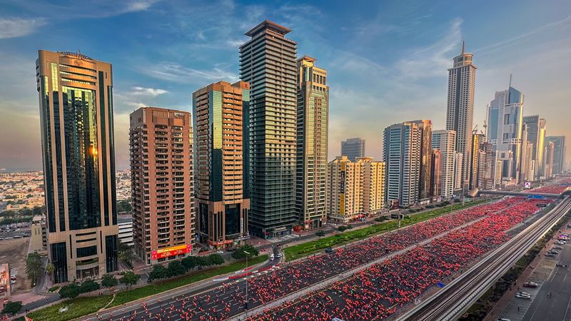 The 'orange army' of runners and walkers took over Dubai’s iconic Sheikh Zayed Road to participate in Dubai Run 2023.
