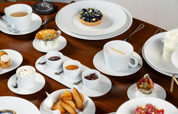 Enjoying UAE-inspired tea and pastries at Aelia during National Day festivities.
