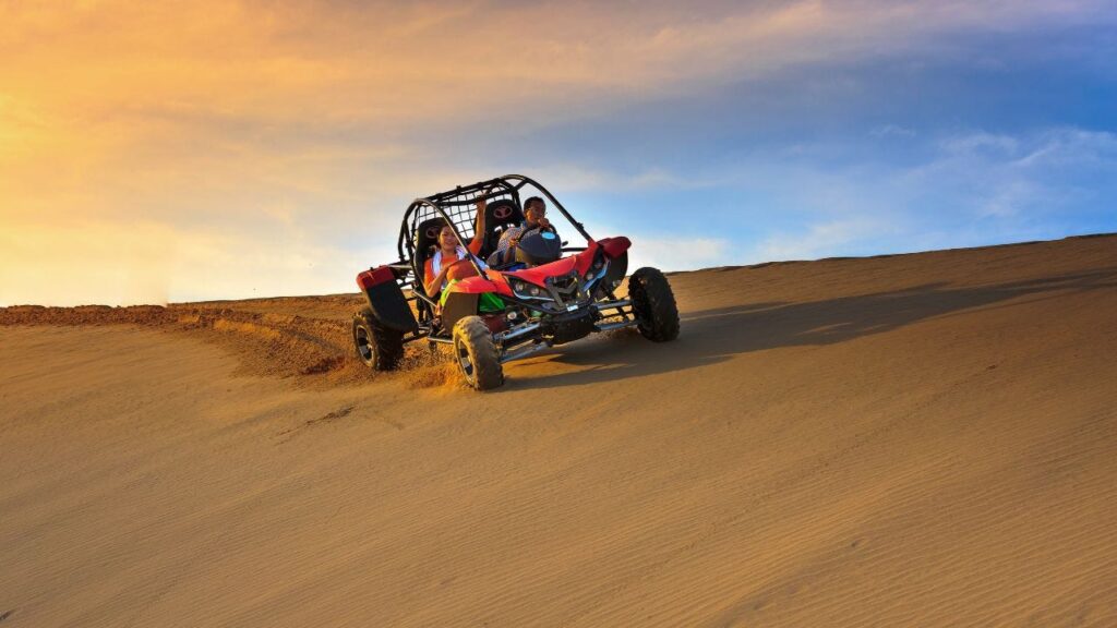 Motorsports at Liwa 2025 - Off-road rally car racing in the desert.