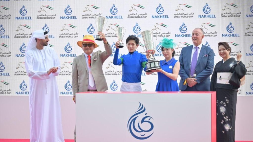 Dubai World Cup winner receiving the $12 million prize at Meydan Racecourse