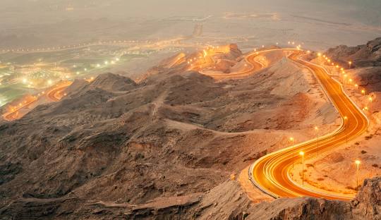 Breathtaking view of the Jebel Jais Mountain, one of the best hiking trails in the UAE, offering scenic vistas and challenging terrain.