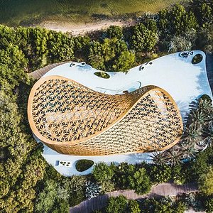 Al Noor Island’s Butterfly House and illuminated walkways, a serene spot for outdoor activities for kids in Sharjah.