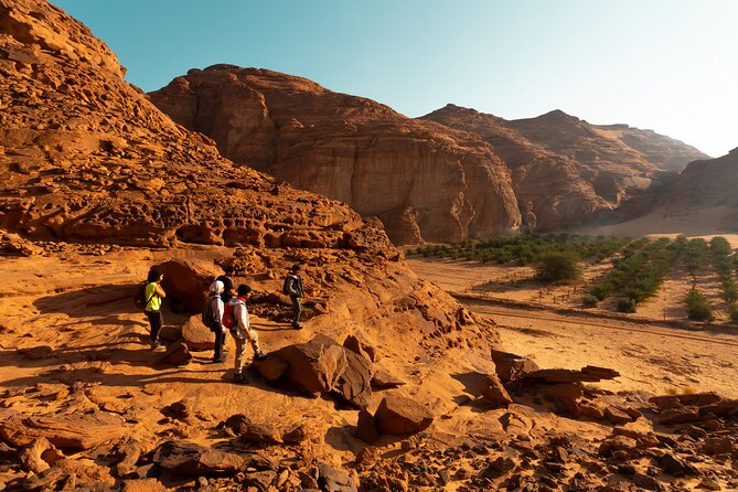 Parallel canyons and ancient petroglyphs in AlUla Hidden Valley, offering a blend of history and adventure for hiking in Saudi Arabia.
