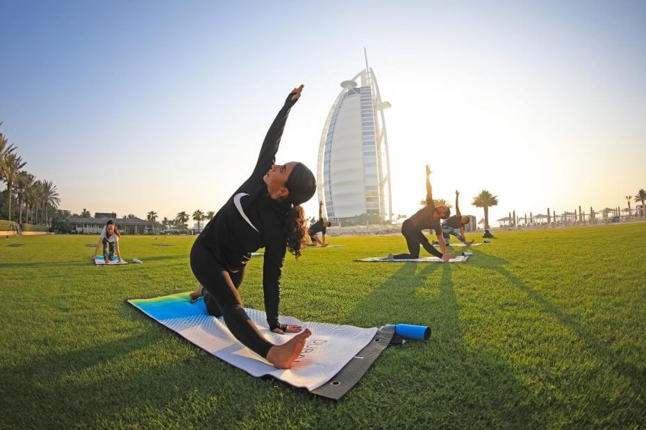 Active lifestyle with walking and yoga for heart wellness.