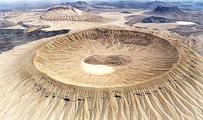 White volcanic ash covering Jabal Abyad, a hidden treasure and unique spot for adventurous hiking in Saudi Arabia.