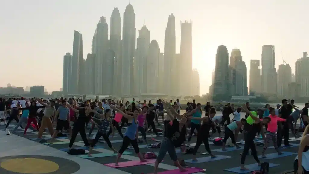 Diverse group of people participating in a fitness activity in the UAE to meet new people and build friendships