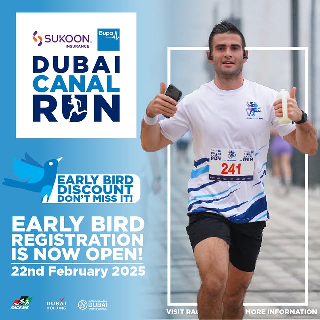 Volunteers providing water to participants during the Sukoon & Bupa Global Dubai Canal Run 2025