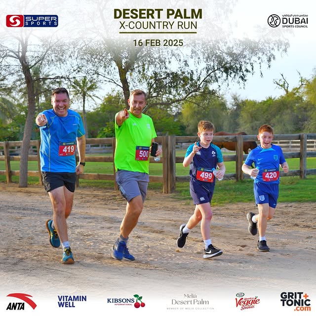 Supporters cheering at the Desert Palm X-Country Run in Dubai.