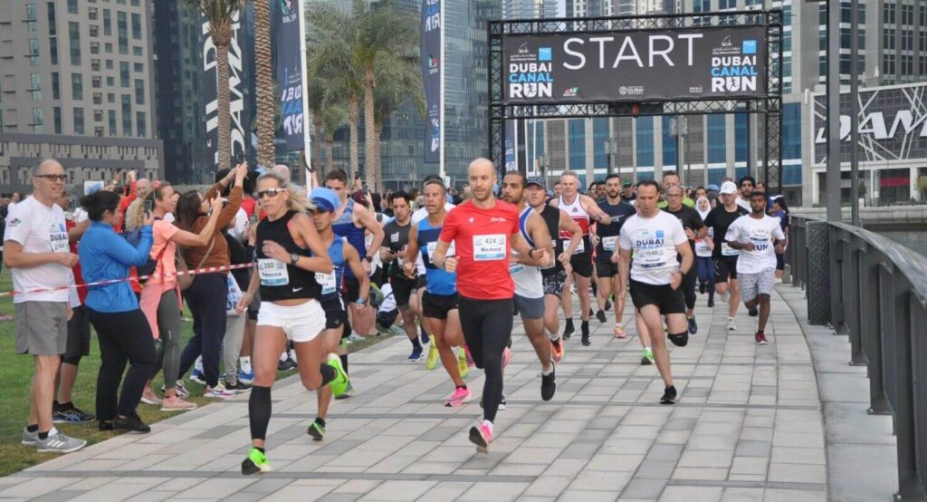 Participants ready to start the Sukoon & Bupa Global Dubai Canal Run 2025 at D3 Park.