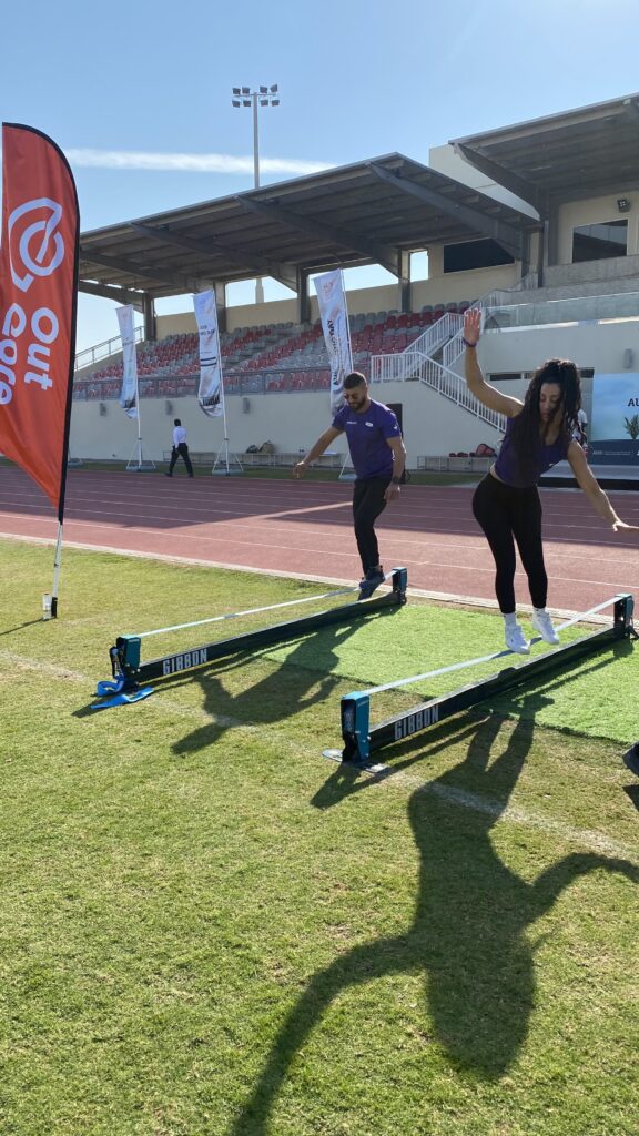 Intermediate slacklining at Dubai park event with Gibbon and OutQore